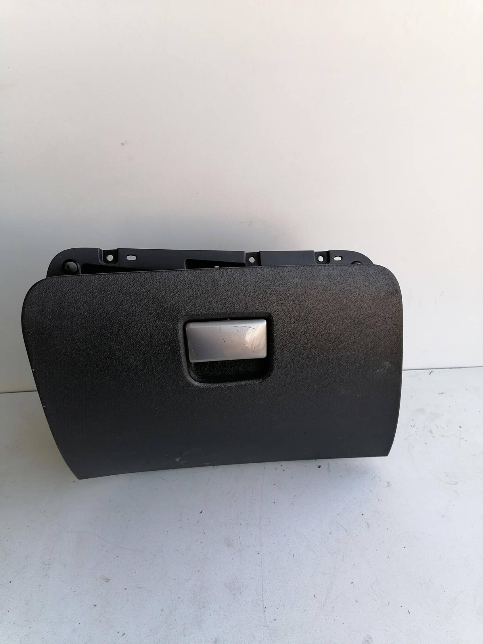 Portaoggetti cruscotto dx.